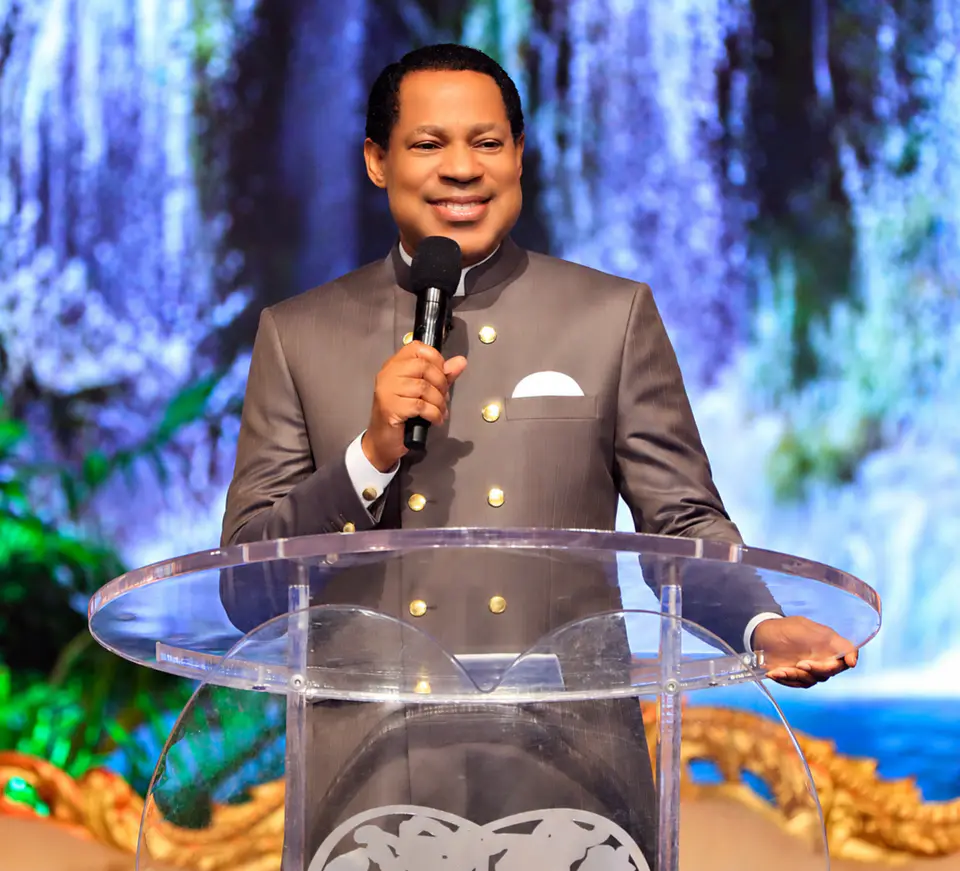 Pastor Chris in prayer